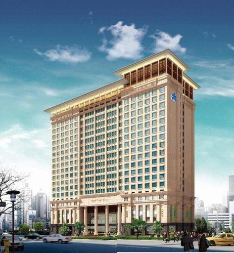 a rendering of a large building in a city at Hotel Nikko Wuxi in Wuxi