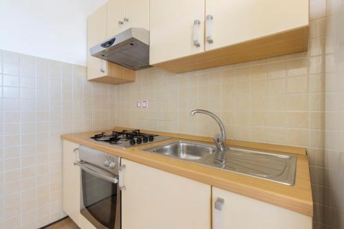 Kuchyňa alebo kuchynka v ubytovaní Bulat Sea View Apartments