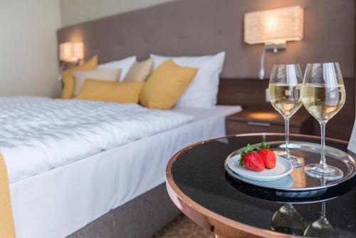 Postel nebo postele na pokoji v ubytování Hotel Thermalpark
