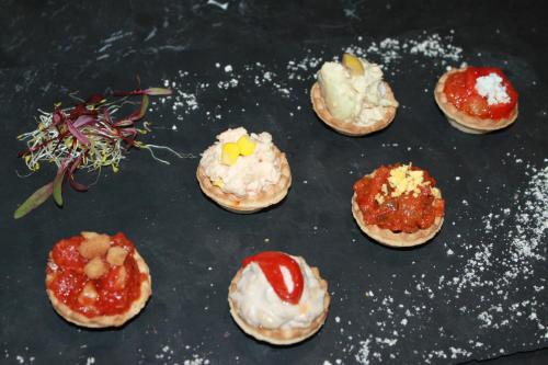 a bunch of different types of food on a table at Hotel Restaurante Santa Cruz in Santa Cruz de Mudela