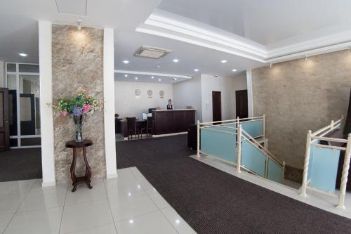 a lobby with a waiting room and a lobby at Complex Oktyabrskiy in Stavropol