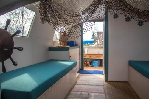 Postel nebo postele na pokoji v ubytování Lake Peipsi boathouses