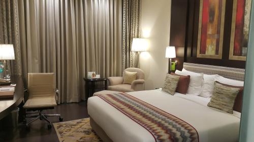 Katil atau katil-katil dalam bilik di Radisson Noida
