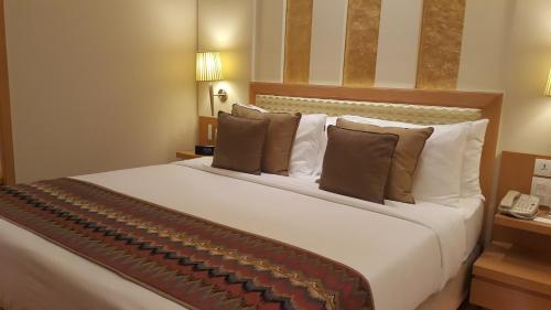 Katil atau katil-katil dalam bilik di Radisson Noida