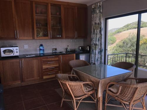 Η κουζίνα ή μικρή κουζίνα στο Waterryk Eco Guest Farm
