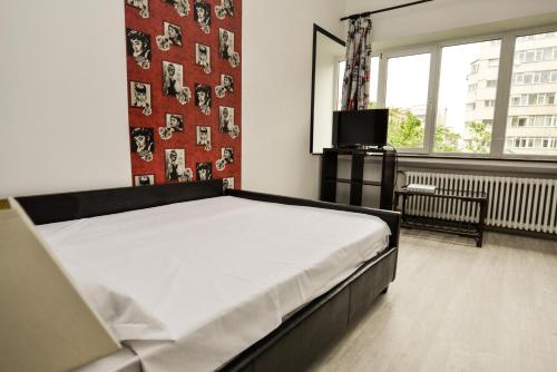 Cama o camas de una habitación en Central Class Bucharest