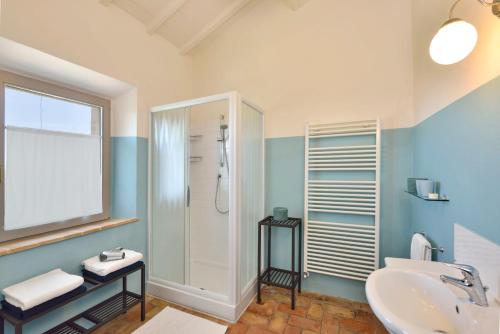 a bathroom with a sink and a shower at B&B Palazzolo La Foce in Chianciano Terme