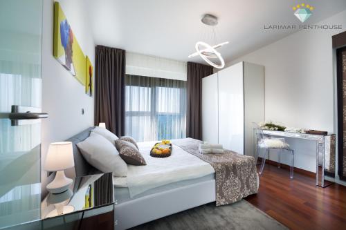 Katil atau katil-katil dalam bilik di Larimar Penthouse