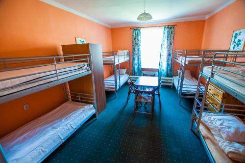 Postel nebo postele na pokoji v ubytování Red Carpet Hostel