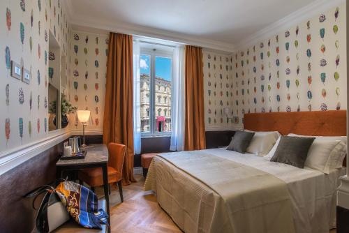 Postel nebo postele na pokoji v ubytování Hotel Damaso