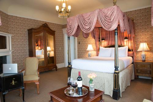 מיטה או מיטות בחדר ב-Hotel Majestic