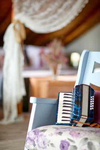 a comb sitting on top of a chair at Archodiko Toliadi Boutique Apartments and Suites in Ouranoupoli