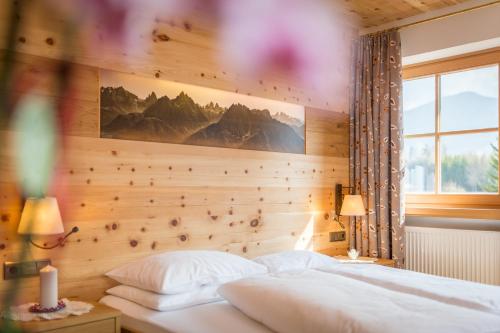 Postel nebo postele na pokoji v ubytování Hotel Hubertushof