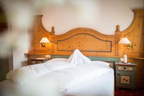 Postel nebo postele na pokoji v ubytování Hotel Hubertushof