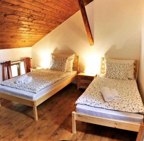 Postel nebo postele na pokoji v ubytování Slezský Grunt