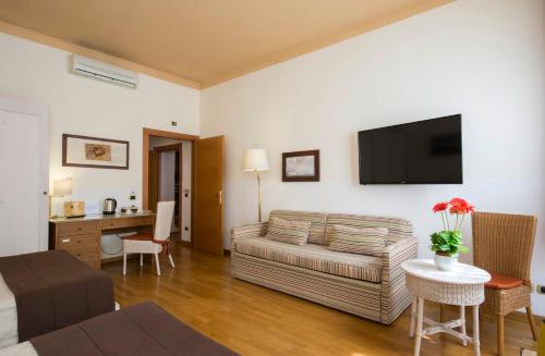 Χώρος καθιστικού στο Piazza Paradiso Accommodation