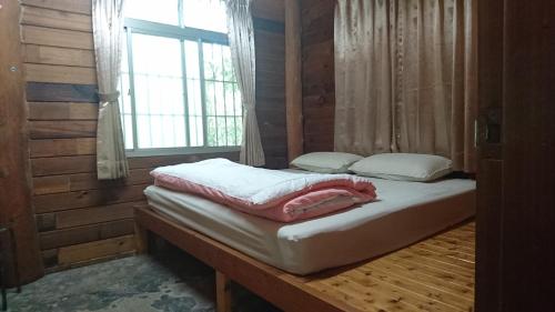 Postel nebo postele na pokoji v ubytování Zhulin View B&B