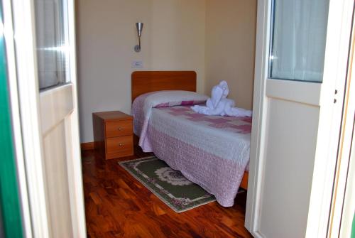 Łóżko lub łóżka w pokoju w obiekcie Casa per Ferie Beato Rosaz