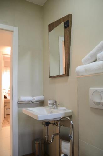 a bathroom with a sink and a mirror at Villa Harmony in Paradise in Svetvinčenat