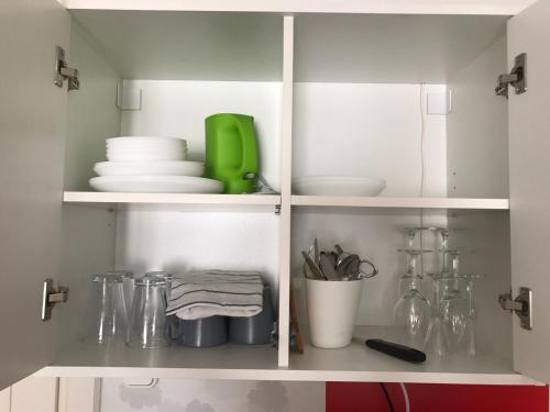 Kuchyň nebo kuchyňský kout v ubytování Hollik Apartmanház