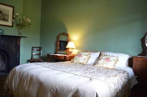 Säng eller sängar i ett rum på Albion Cottage