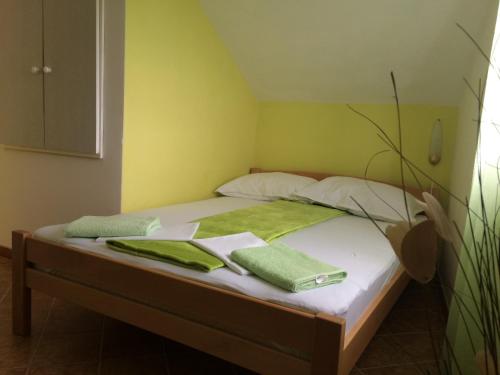 Posteľ alebo postele v izbe v ubytovaní Apartments Nina