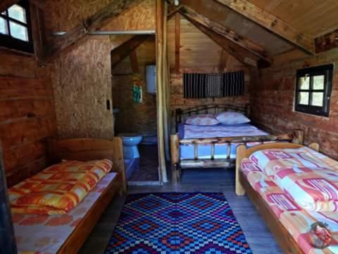 Postel nebo postele na pokoji v ubytování Etno kuce Miljevic