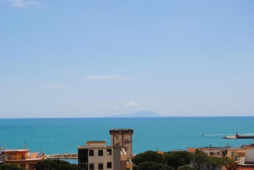 a view of the ocean from a city at Damahouse in Formia
