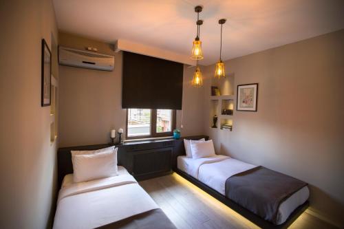 Tempat tidur dalam kamar di Cityloft 36