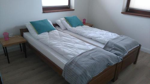 Ένα ή περισσότερα κρεβάτια σε δωμάτιο στο Apartament Słoneczny 6 Kościelisko