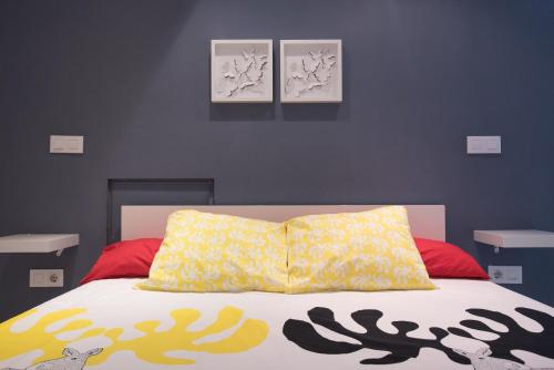 Katil atau katil-katil dalam bilik di Apartamento Centro Sevilla
