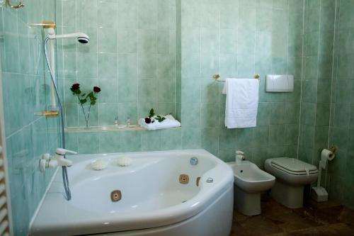 Ένα μπάνιο στο Hotel Molino Rosso