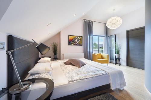 Postel nebo postele na pokoji v ubytování Bled Apartment Kirsch