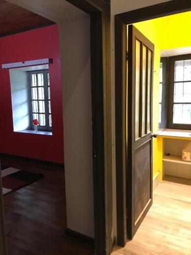 an empty room with a door and a window at The White House by Casona Lo Aguirre - El Monte RM in Talagante