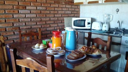 Una cocina o zona de cocina en Cabañas de Nené Aparts