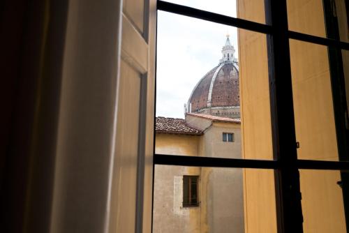 a view from a window of a building at The Artists' Palace Florence in Florence
