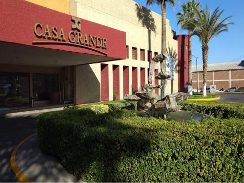 a building with a sign that reads casa grande at Casa Grande Chihuahua in Chihuahua