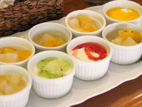 a plate of different types of dipping sauces at Green Rich Hotel Suizenji in Kumamoto
