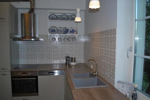 Virtuvė arba virtuvėlė apgyvendinimo įstaigoje Vila Joana