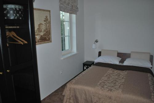 Posteľ alebo postele v izbe v ubytovaní Vila Joana