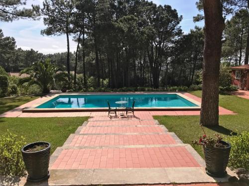 
The swimming pool at or near Casa de Janas

