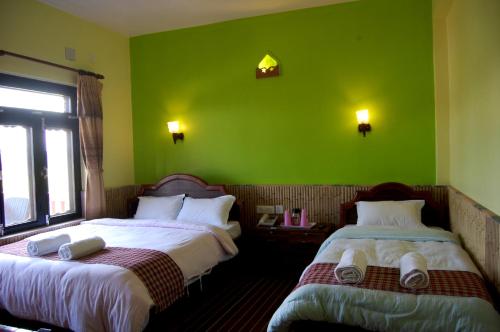 Postel nebo postele na pokoji v ubytování Sweet Home