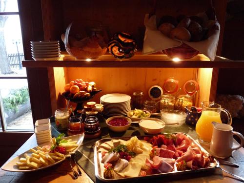 a table with a tray of food on a table at Berggasthof Koitsche im Naturpark Zittauer Gebirge in Bertsdorf