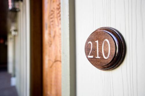 a close up of a house number on a door at The Inlet Sports Lodge in Myrtle Beach