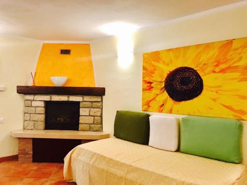 A bed or beds in a room at Appartamento Armonia