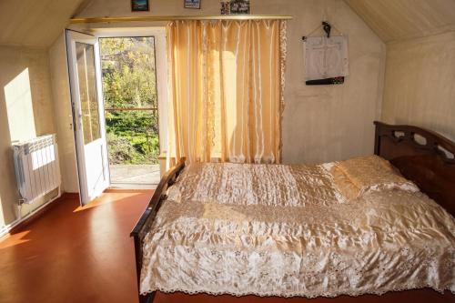 Кровать или кровати в номере Areni House B&B