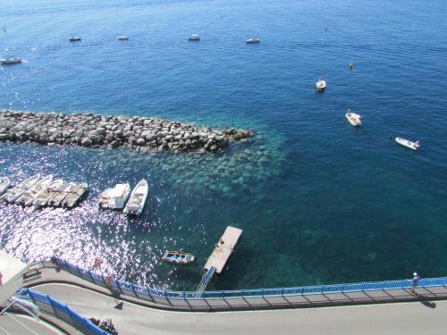an aerial view of a group of boats in the water at Domus Claudia in Atrani