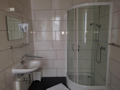 Ein Badezimmer in der Unterkunft Hotel Domhof