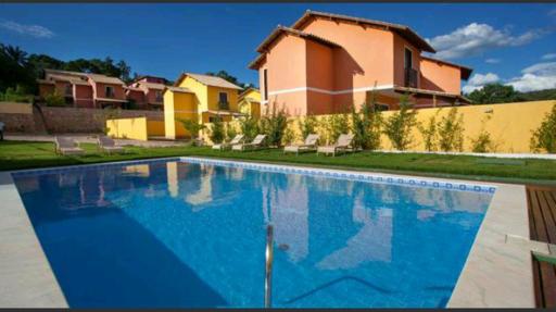 Casa 2 suítes com ar - Até 6 pessoas - em condomínio com piscina - Housity