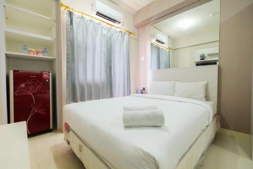Studio Green Pramuka City a Serene Apartment Living By Travelio - Housity